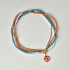 collier oro corallo turchese